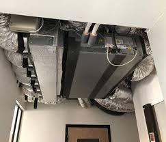 Climatisation gainable encastrée dans un faux plafond — chantier WCE